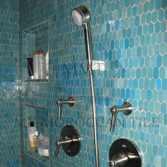 Beautiful master bathroom with turquoise blue moroccan mosaic tile honeycomb hexagonal tile